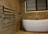 Bathroom renovations - Freestanding bath with niche & heated towel rack