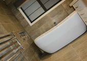 Bathroom renovations - Freestanding bath with niche & heated towel rack