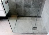 Tiled shower base with custom channel & grate